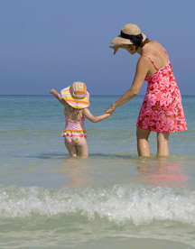 mom and baby in water